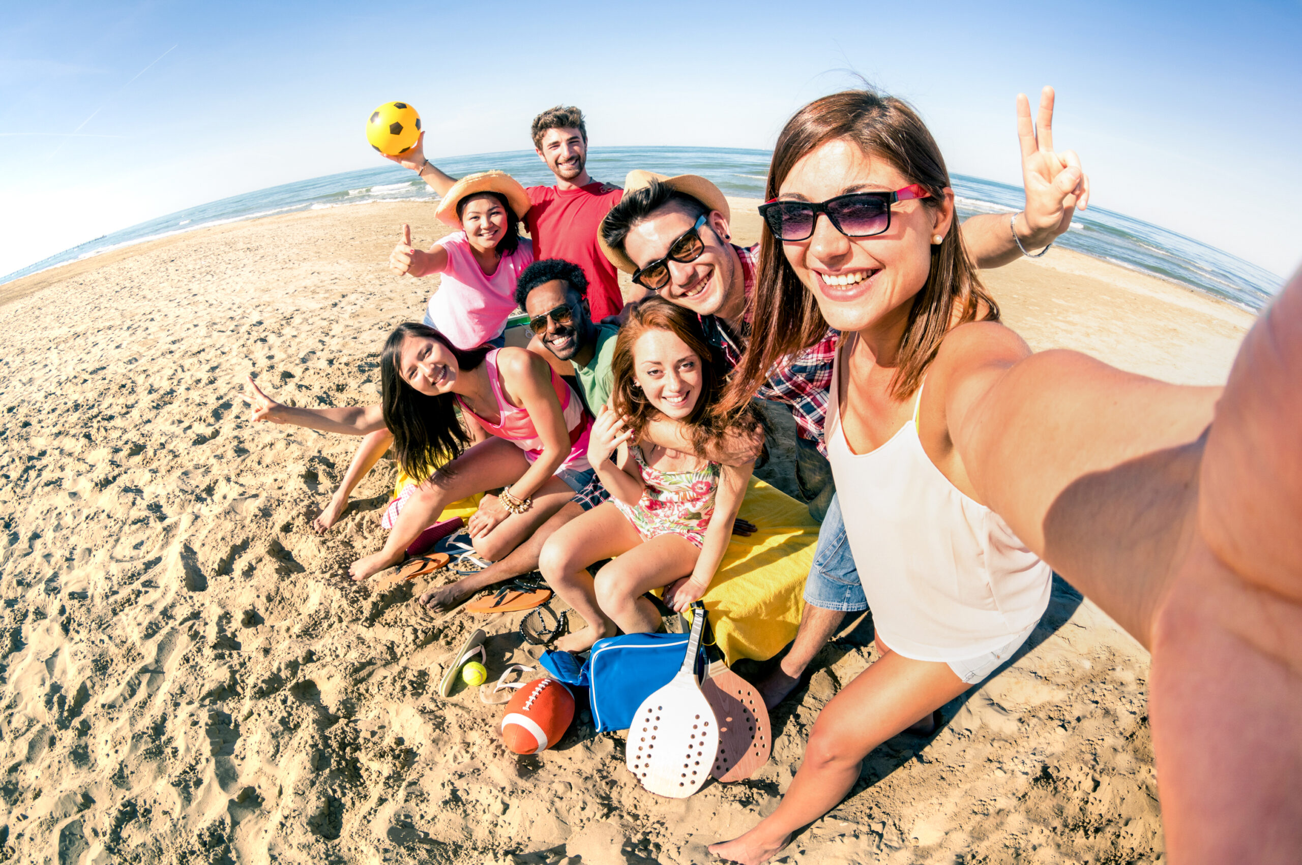 People playing at the beach. 101 NOMADS